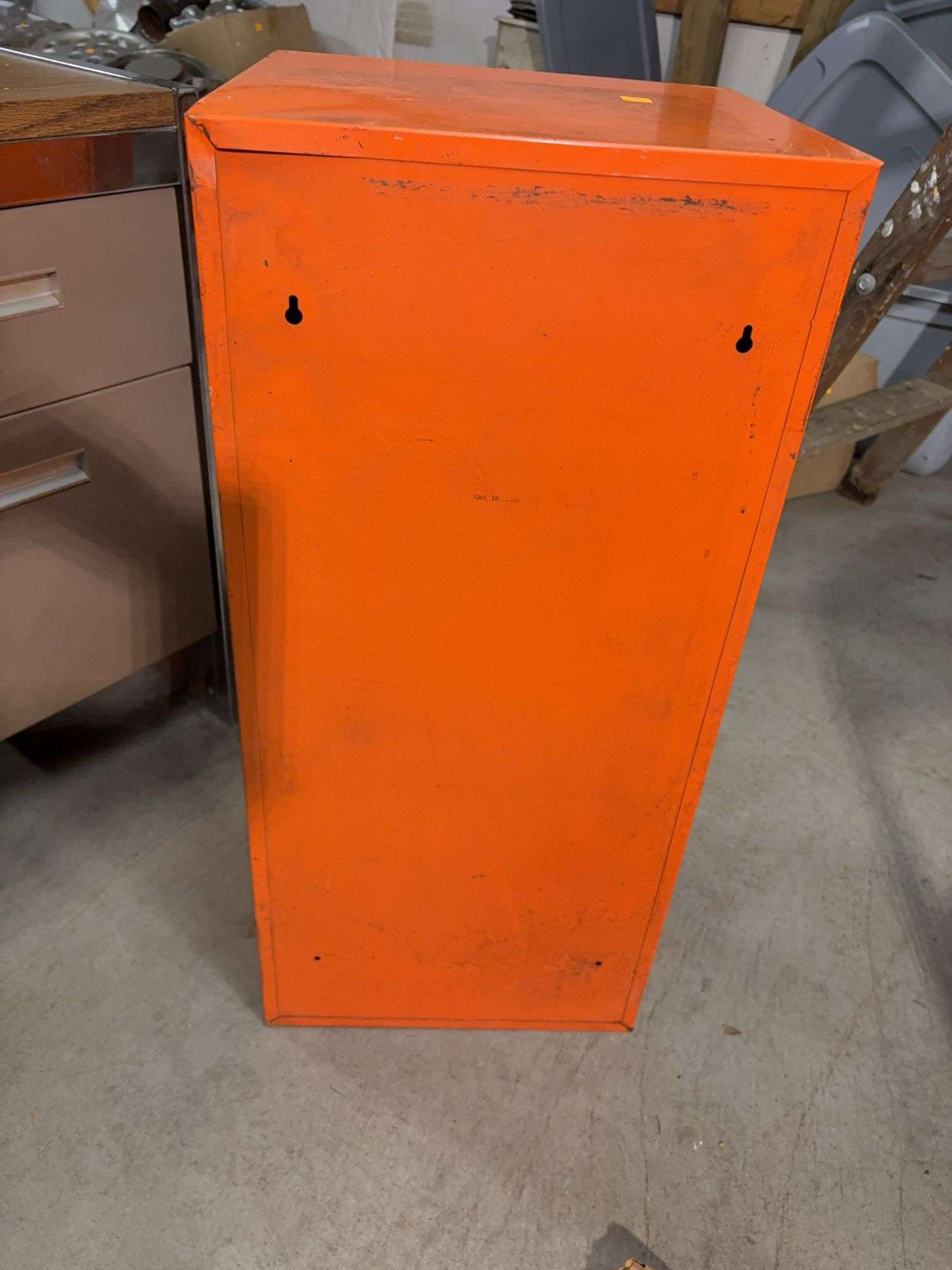 Orange metal storage cabinet marked Kent with keys - 14" x 13" x 30"