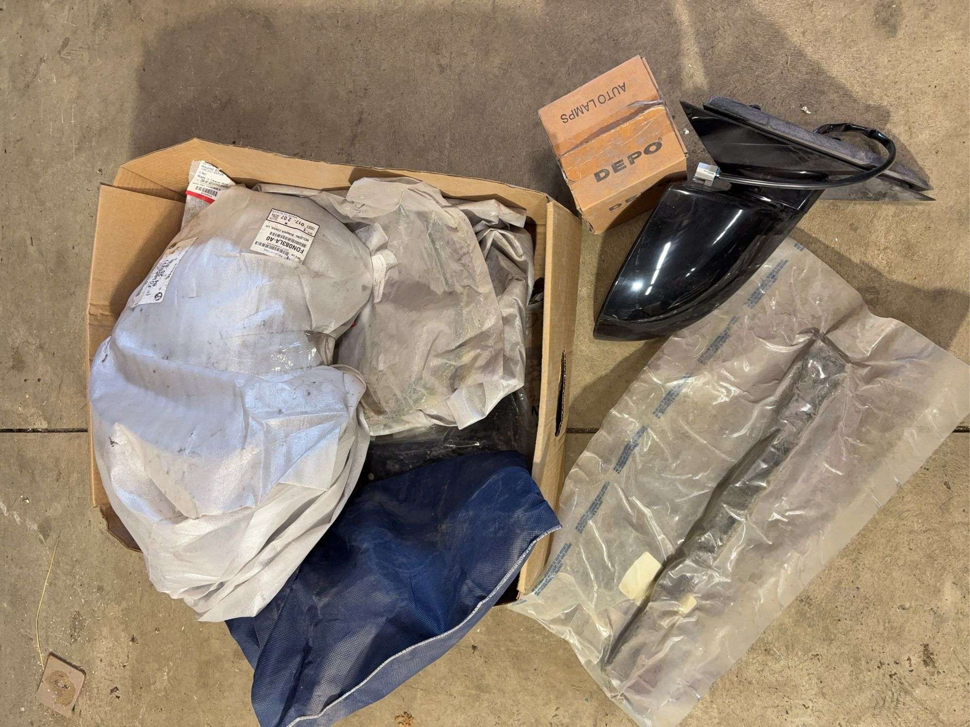 Box of car parts -mirror, bumper covers, Auto Lamps and more -See photos
