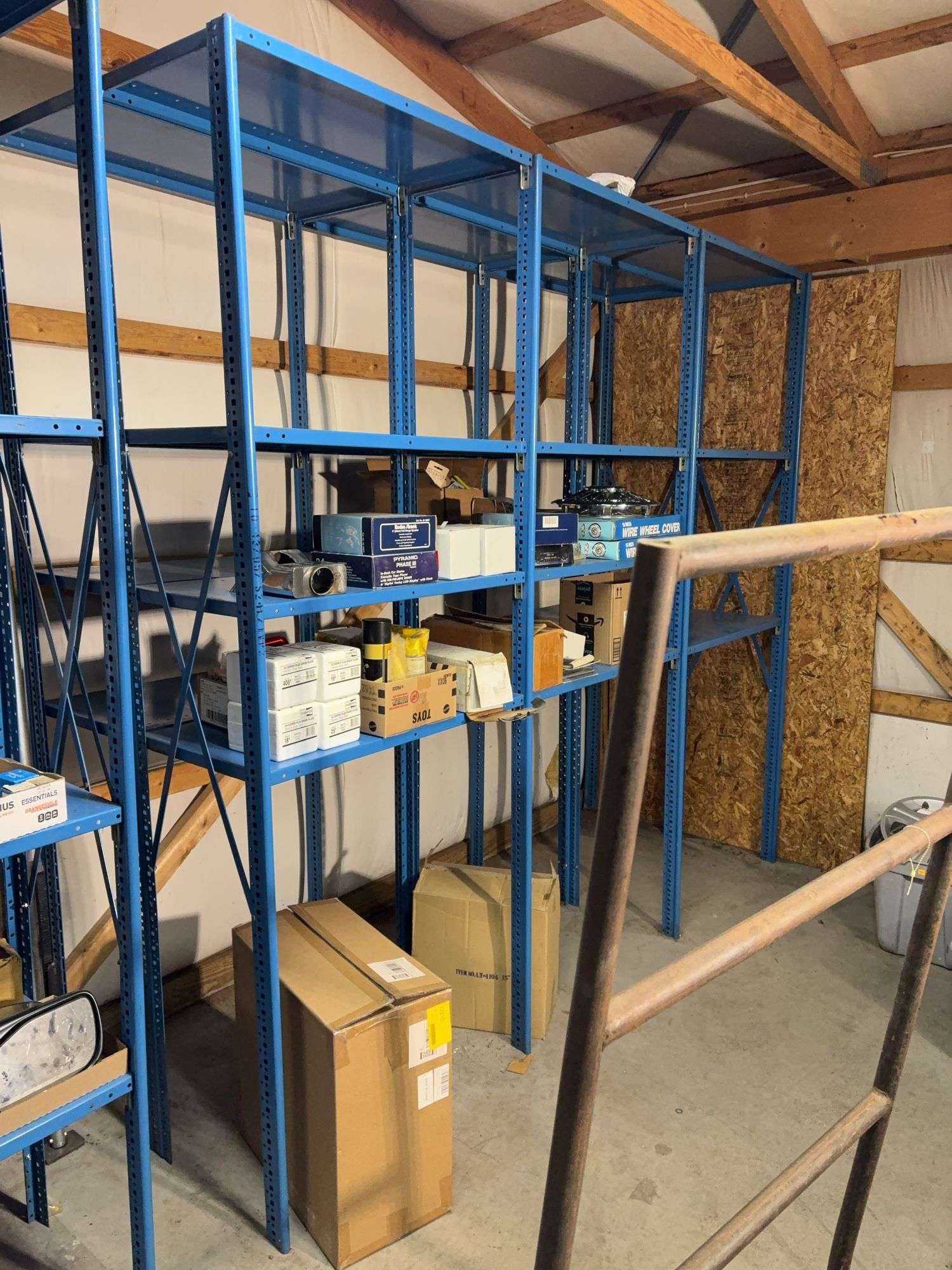 Large blue storage shelf 9’ long, 3’ deep, 7.5’ tall -contents not included