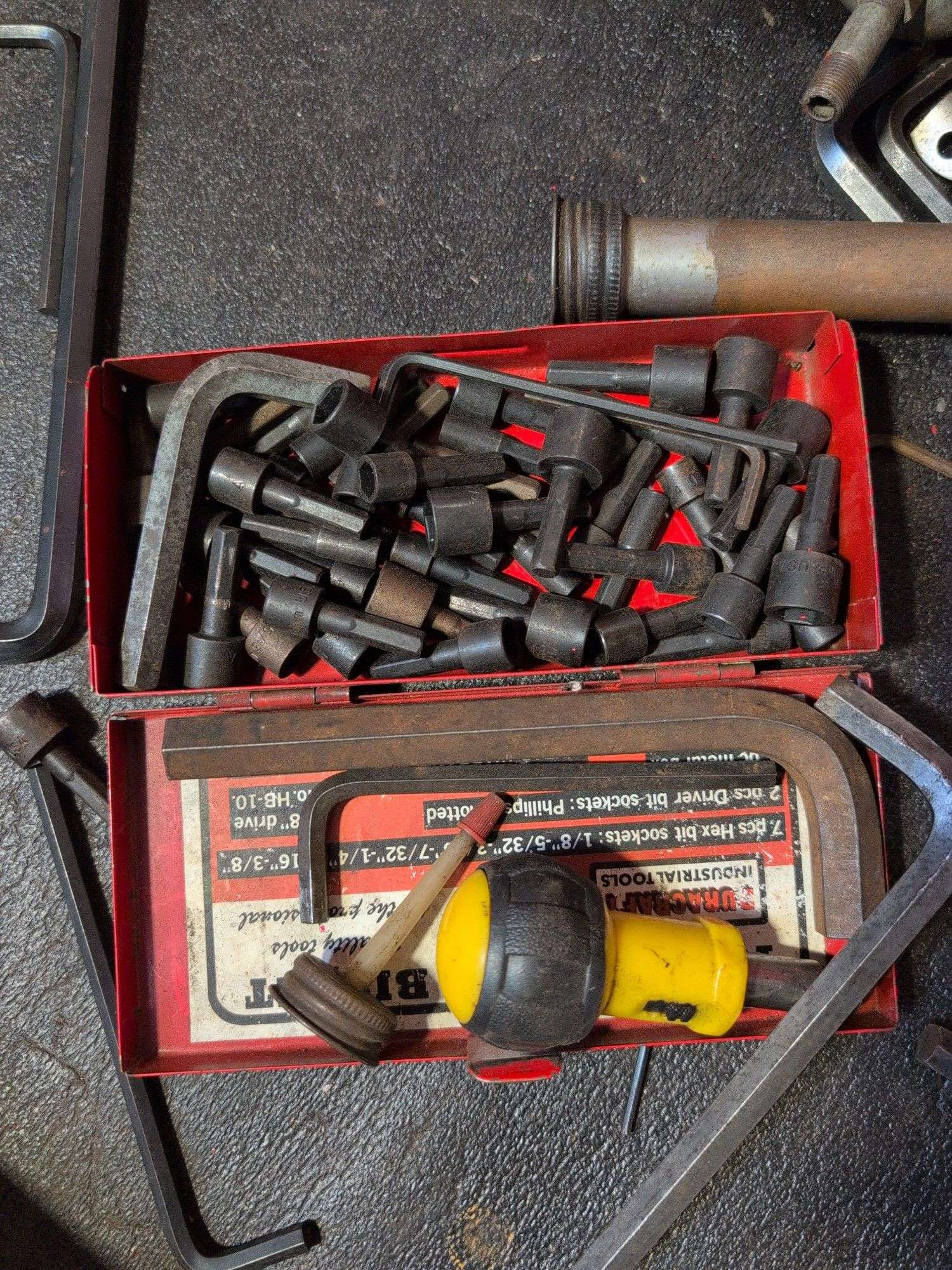 Drawer of drill bits, Allen wrenches, sockets, and more