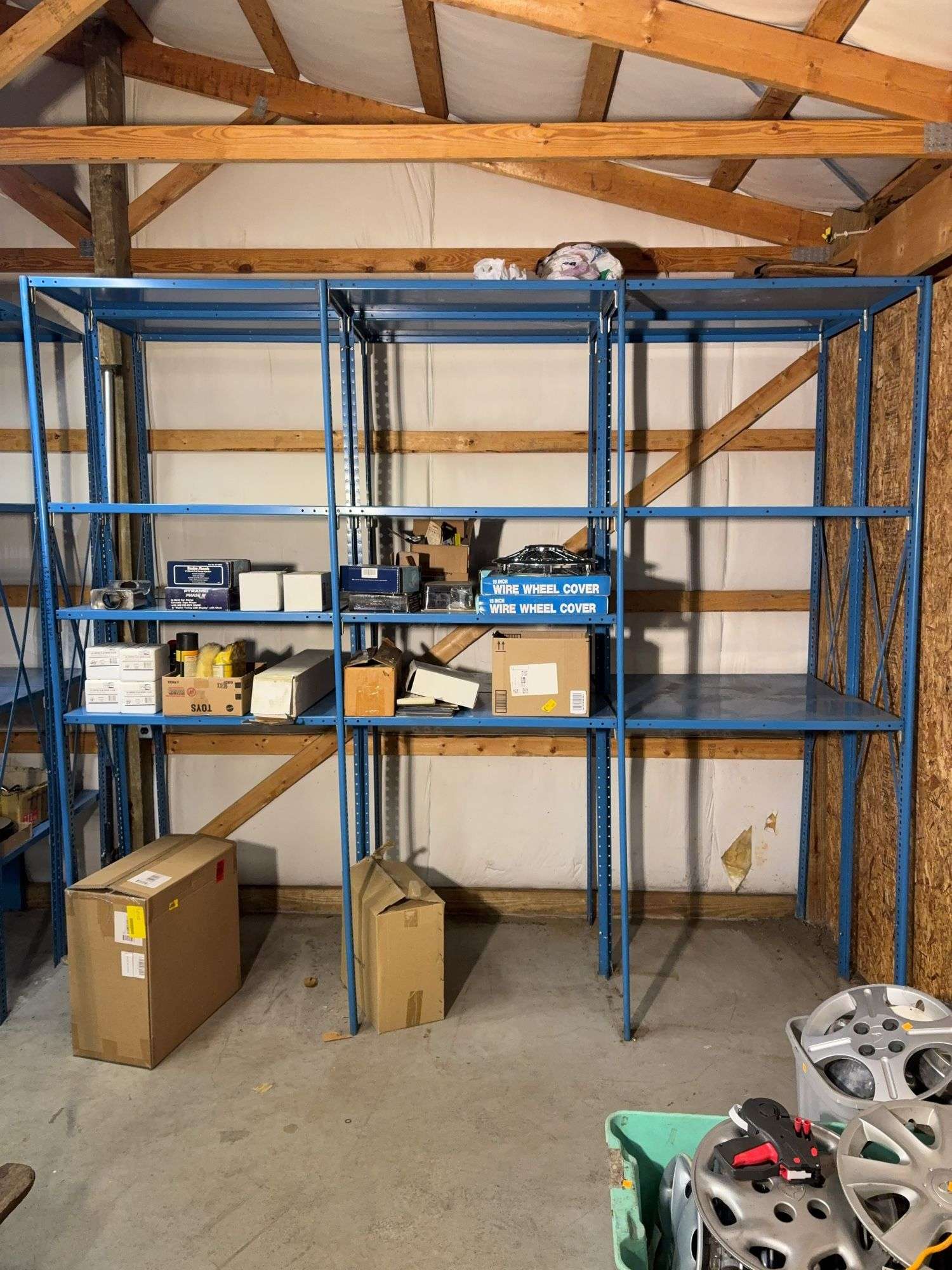 Large blue storage shelf 9’ long, 3’ deep, 7.5’ tall -contents not included