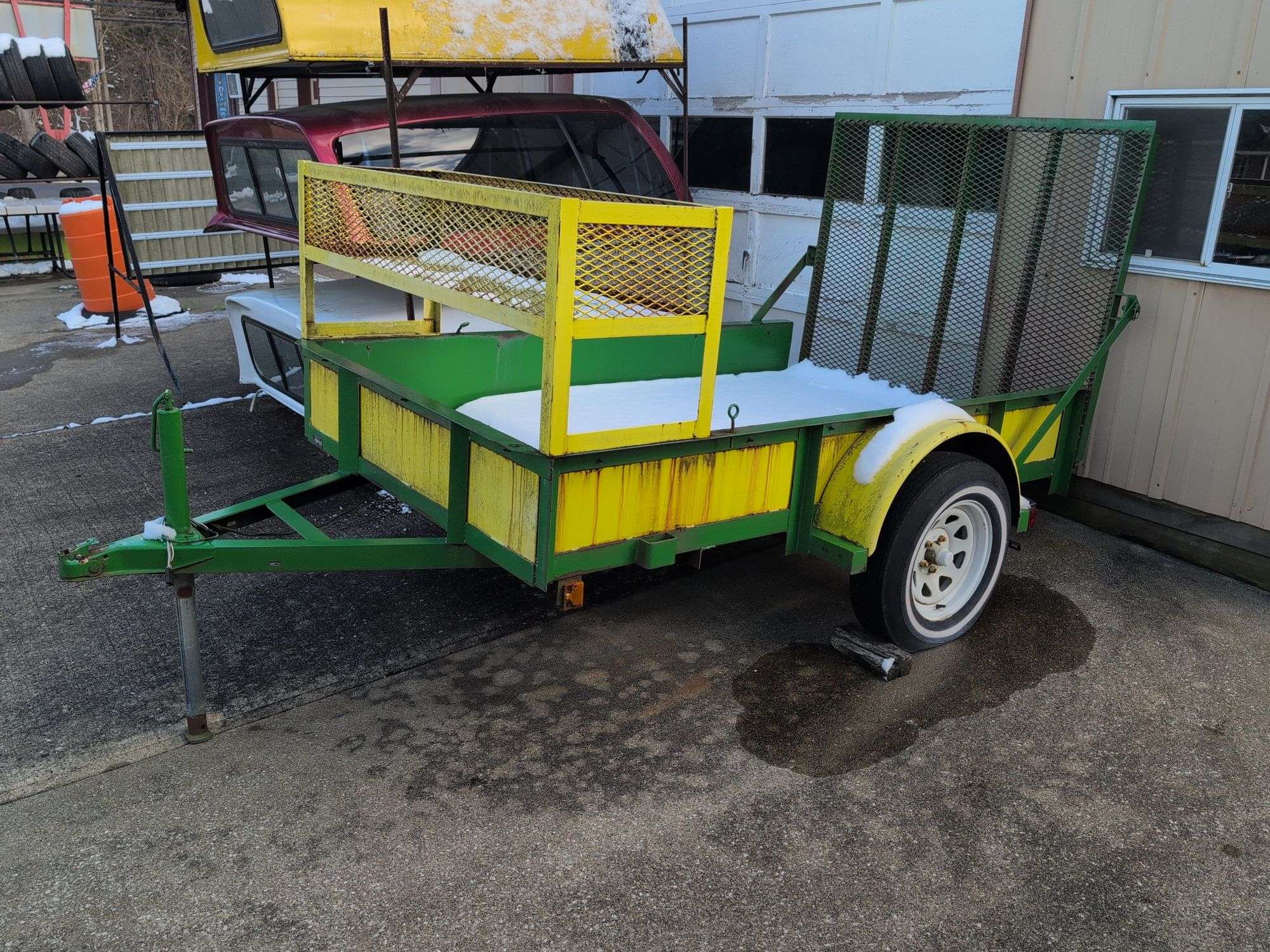Open green and yellow trailer - 8' x 5' bed - 2" ball hitch - flat tire