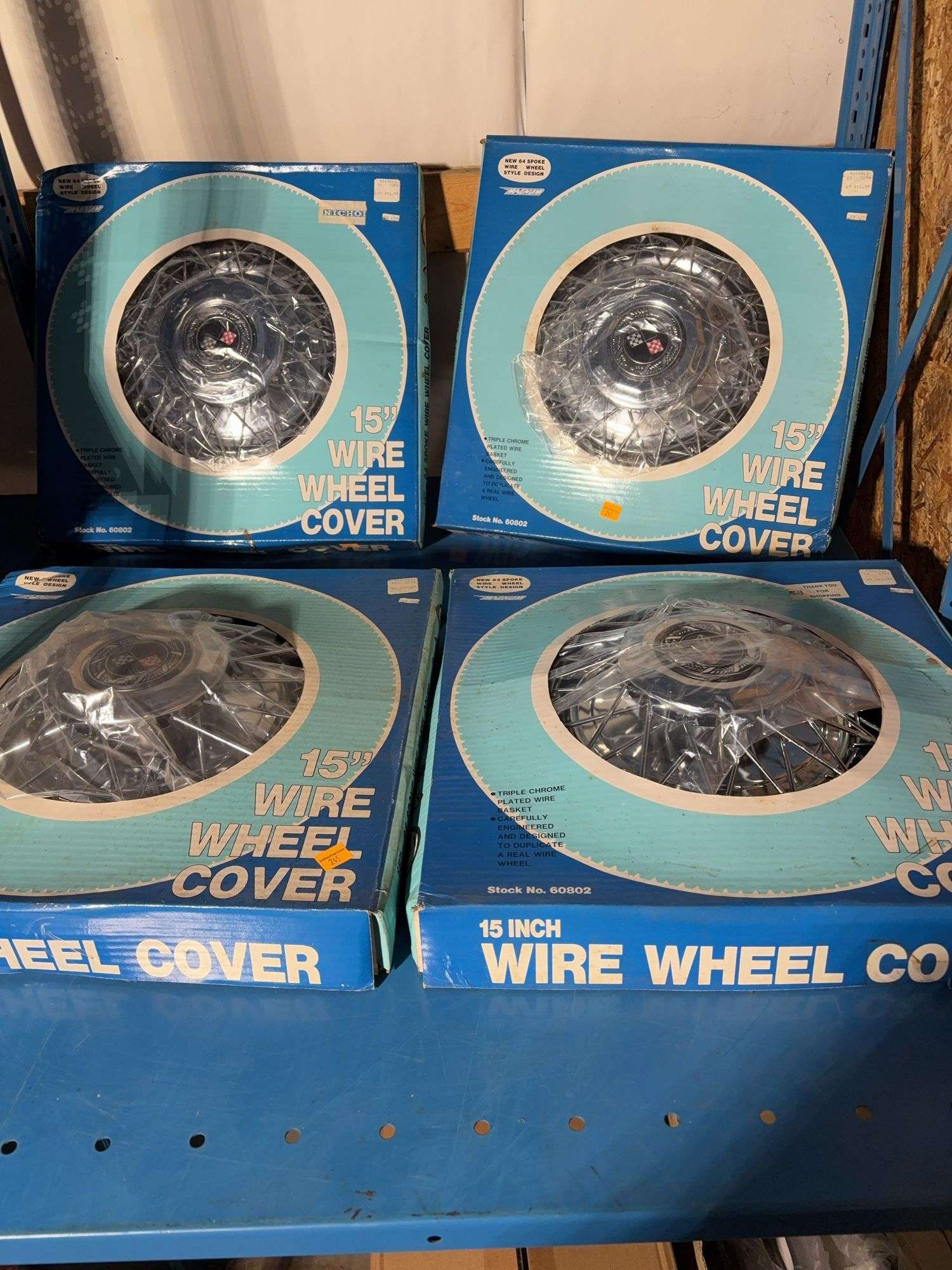 (4) 15 inch wire wheel covers matching in box