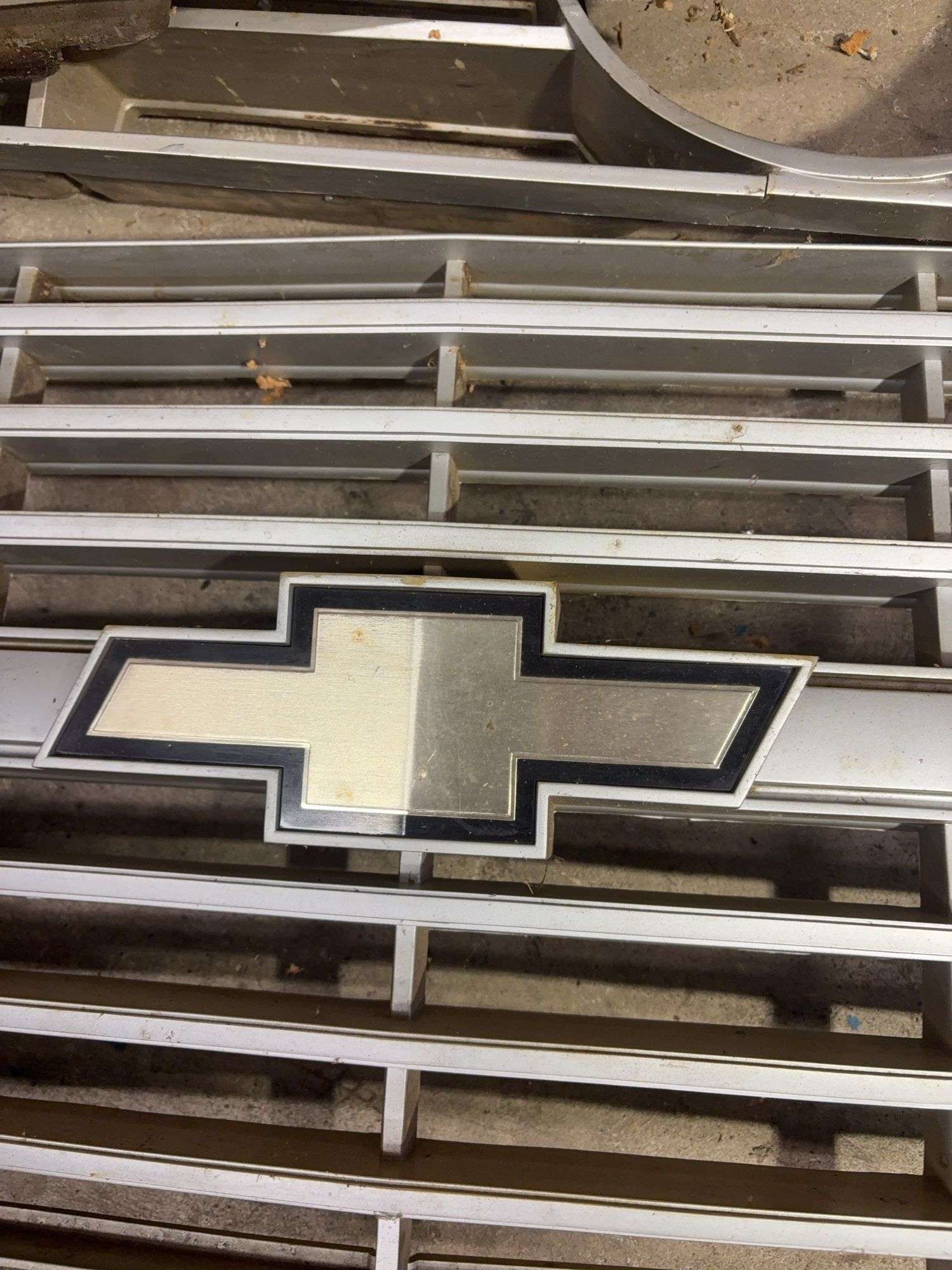 Miscellaneous grill covers, other vehicle parts and emblems