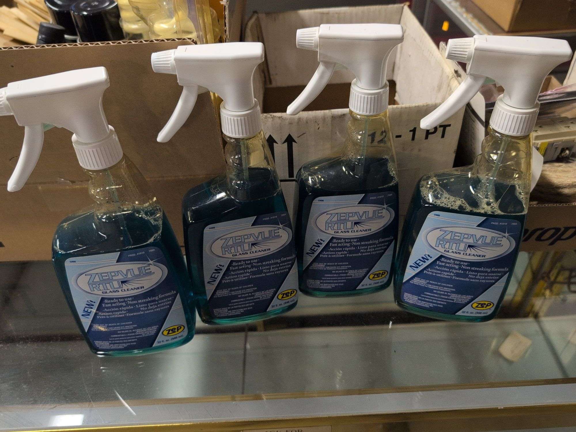 (4) bottles of glass cleaners