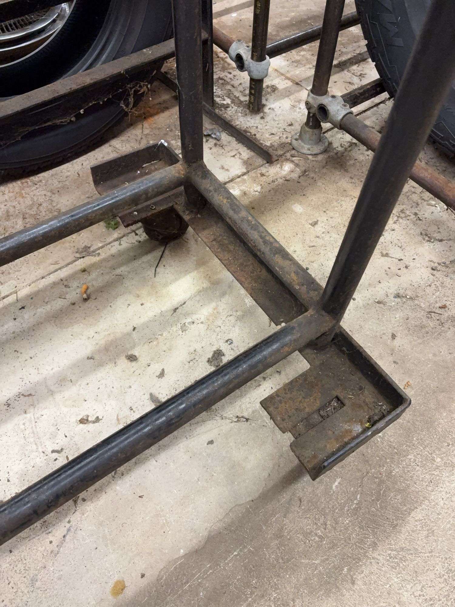 Metal tire rack on wheels - 86" x 14" x 75"