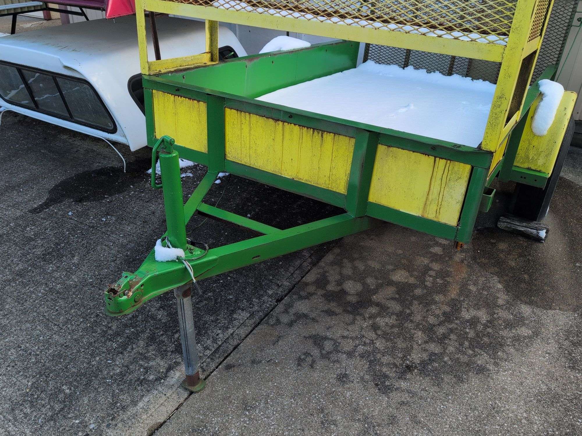 Open green and yellow trailer - 8' x 5' bed - 2" ball hitch - flat tire