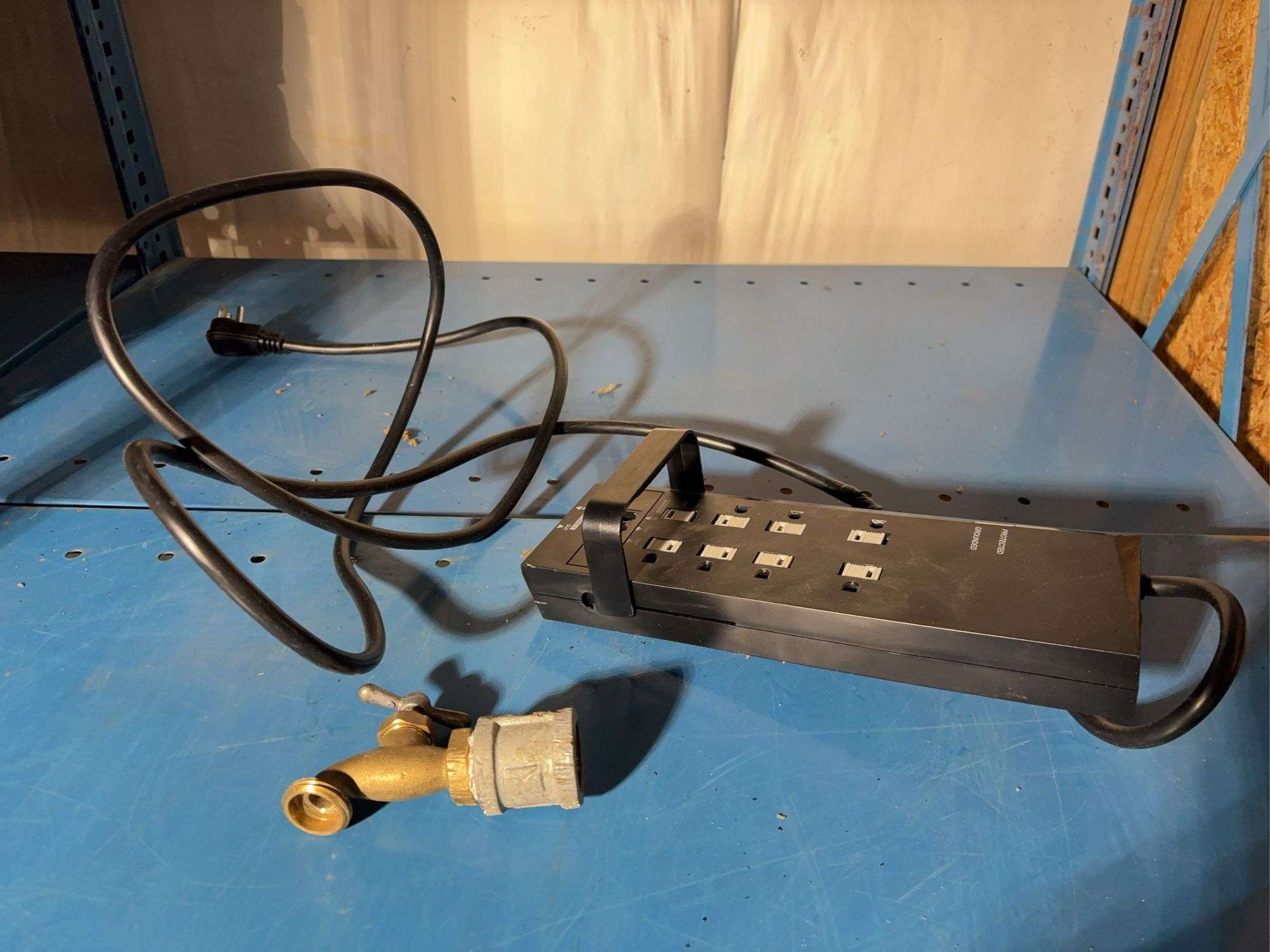 Power surge protector and water faucet