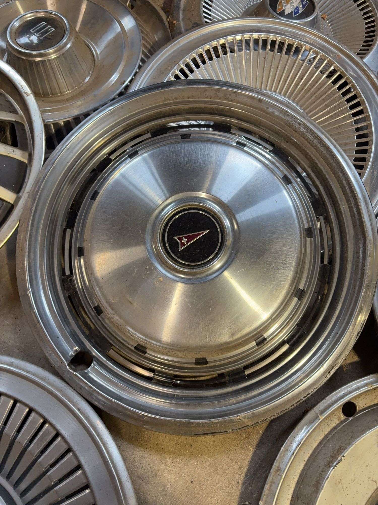 15+ hubcaps - see photos - Thunderbird, Rambler, Buick, and more