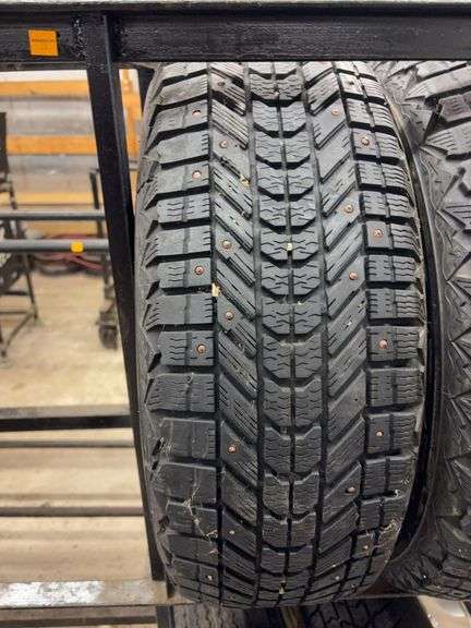 (4) studded tires like new - 225/60/17