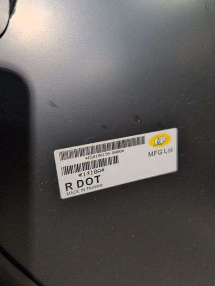 Unmarked black vehicle hood - see photos