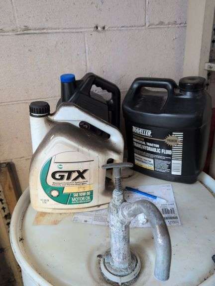 Assortment of motor oil and other vehicle fluids - most partially full