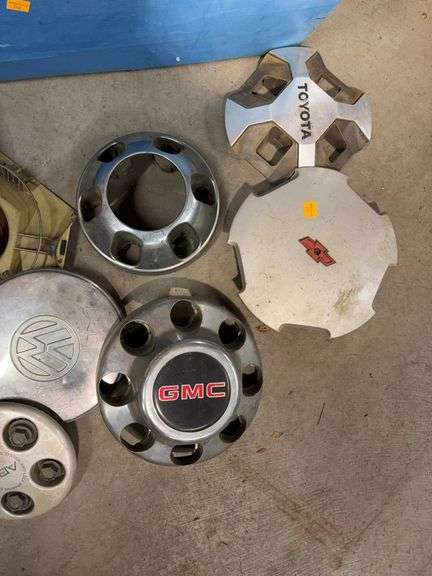 Tote of miscellaneous hubcaps/center caps - Chevy, Toyota, and more