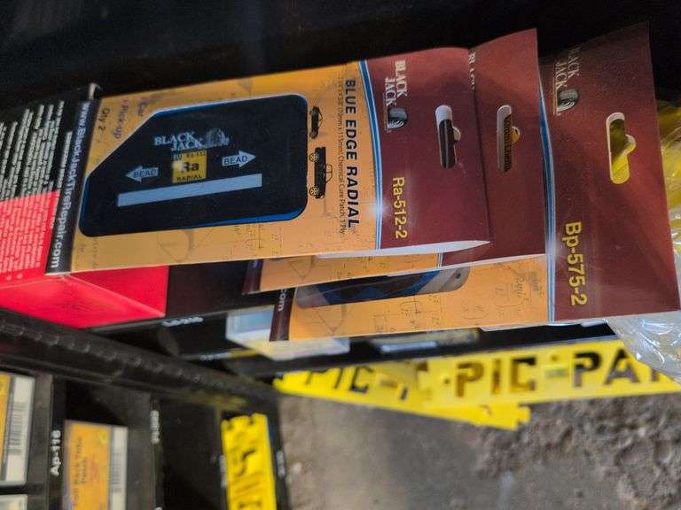 Metal tire repair cabinet with contents