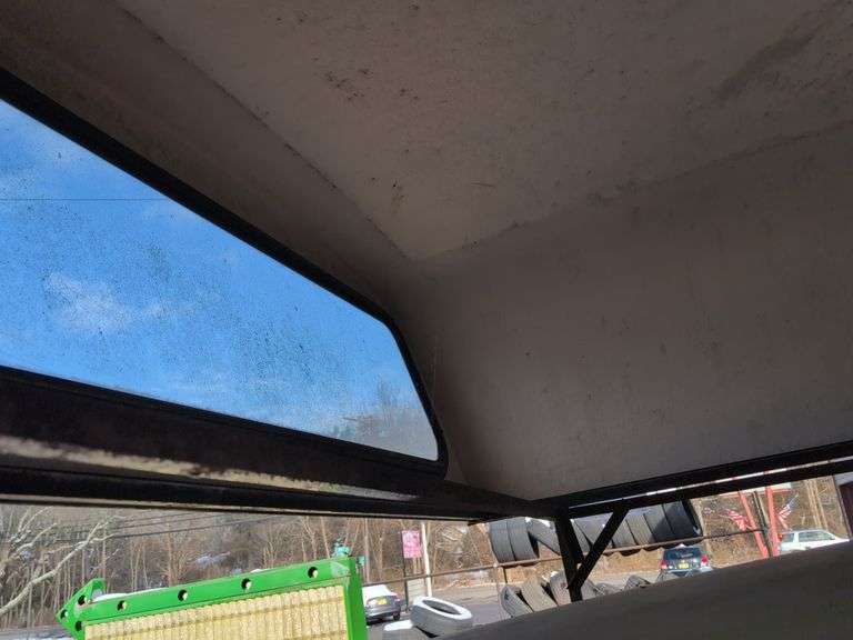 Yellow truckbed cap for a Dodge - 6' wide, 79" long