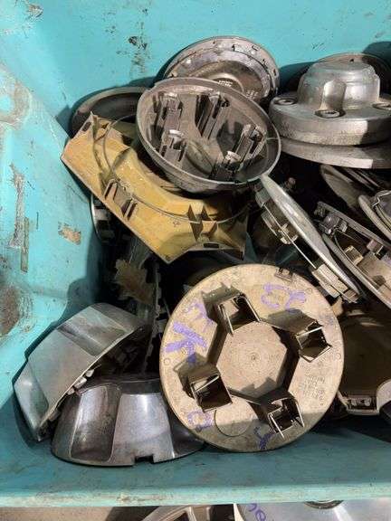 Large tote of hub caps and parts -Honda, Mazda, Nissan and more