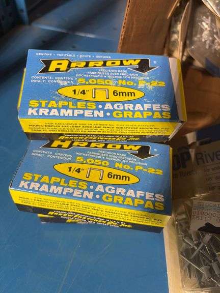 Box of pop rivets mostly unopened, Arrow staples, New Holland parts and more