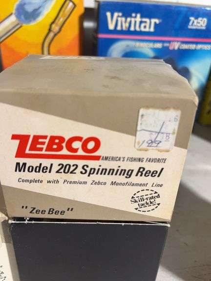 Vivitar Binoculars, Tempest propane torch, spinning reels, Caulk and more