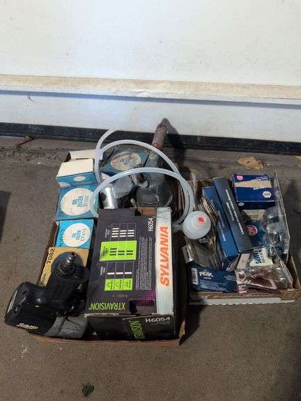 Miscellaneous oil filters, lights, impact wrench, and more