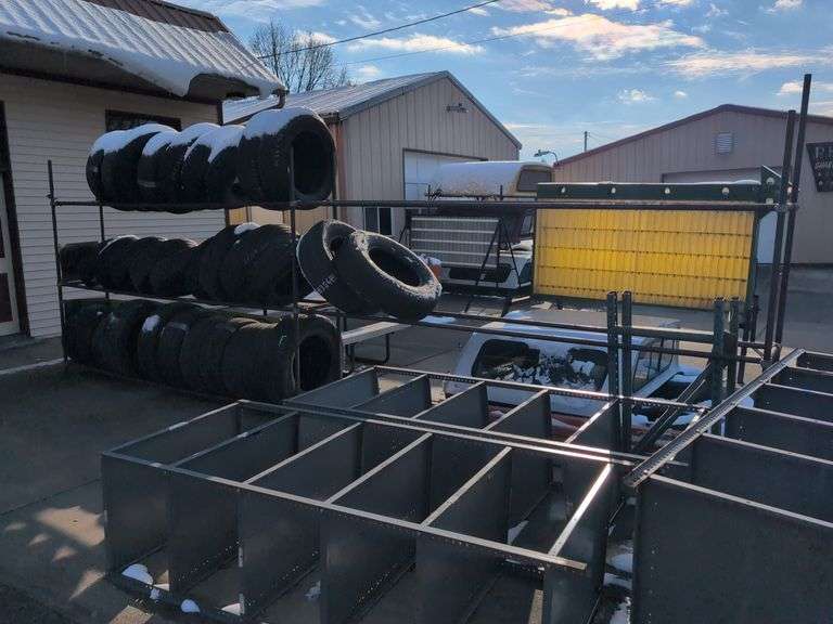 Metal tire rack - 21' x 18" x 7' - stored outside, contents not included