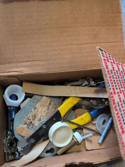 Shelf of shop rags and vehicle fluids