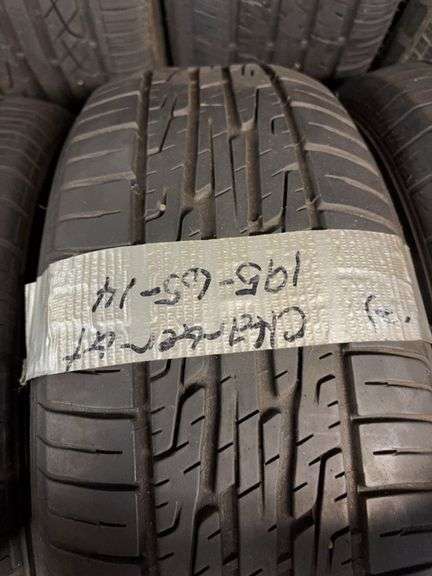 (4) miscellaneous tires like new - (2) 15", (2) 14" - see photos