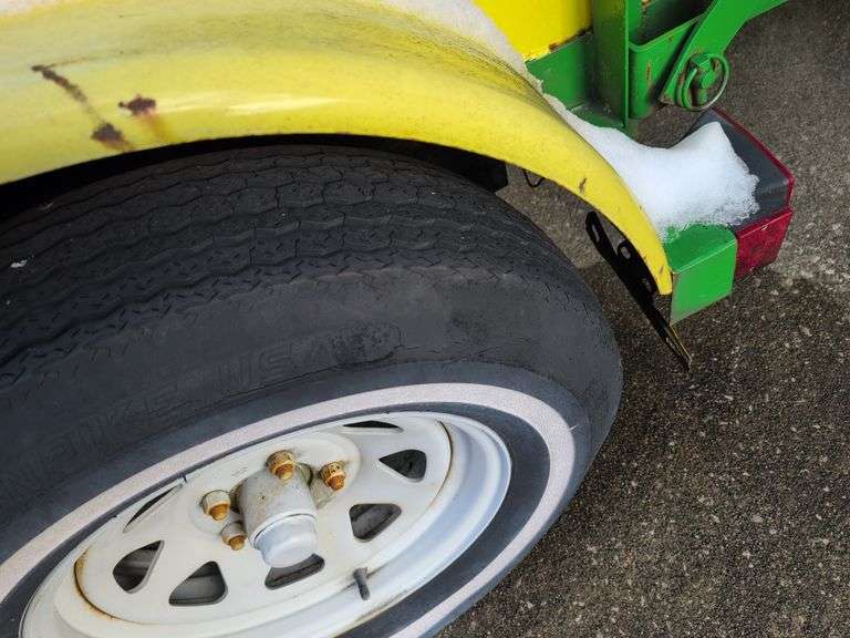 Open green and yellow trailer - 8' x 5' bed - 2" ball hitch - flat tire