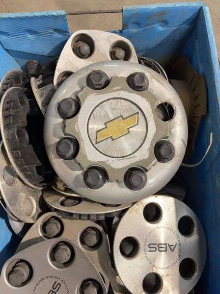 Tote of miscellaneous hubcaps/center caps - Chevy, Toyota, and more