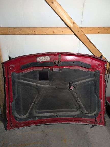 Black Chrysler vehicle hood - see photos