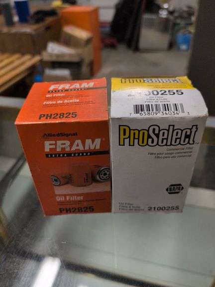 Assortment of oil filters in boxes - see photos