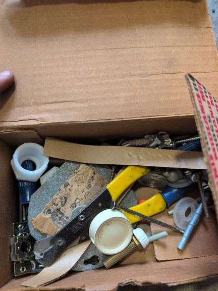 Shelf of shop rags and vehicle fluids