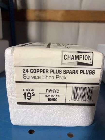 (4) Champion boxes of 24 copper plus spark plugs