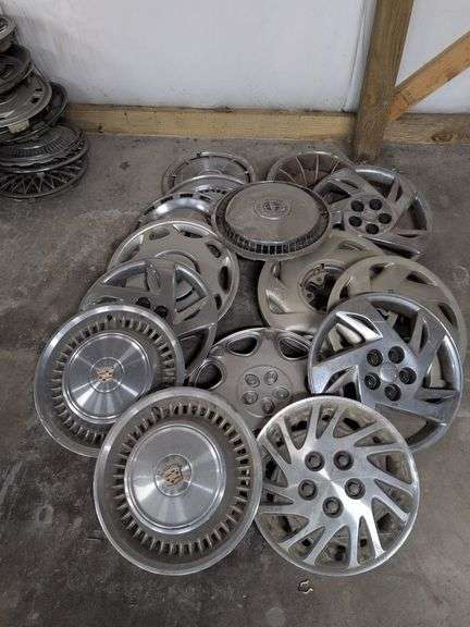 15+ hubcaps - Cadillac, Chevy, Pontiac, and others