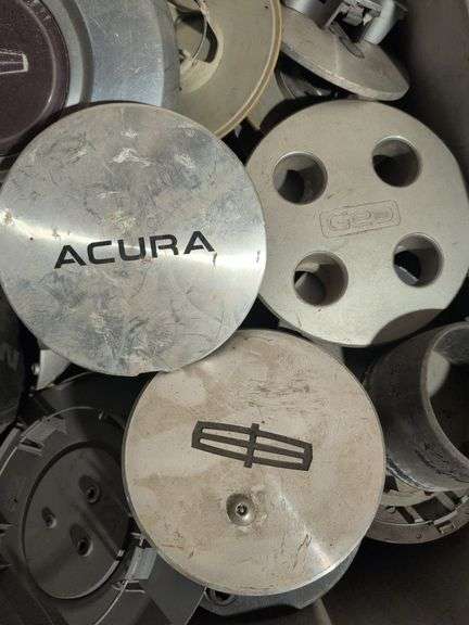Tote of hubcaps/center caps - Acura, Nissan, Ram, and many more