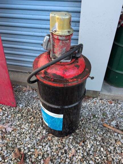 Ford airless spray undercoating with Balcrank industrial pump - appears empty