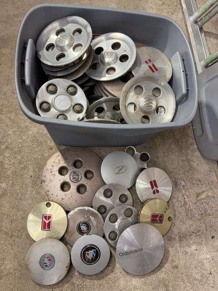 Tote of Oldsmobile hub caps and covers