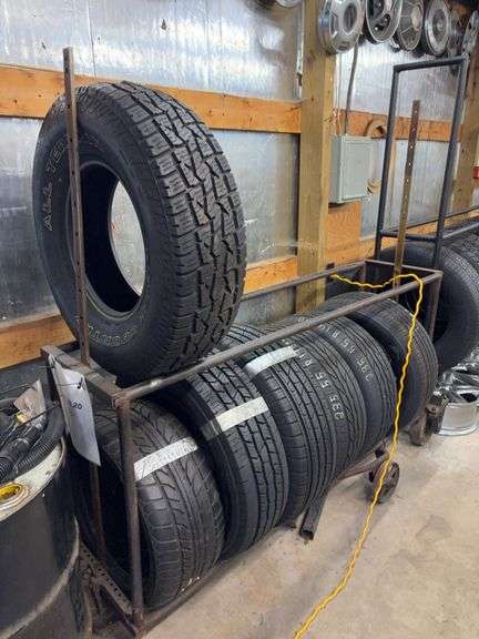 Metal tire rack on wheels - 74" long, 18" deep, 72" tall