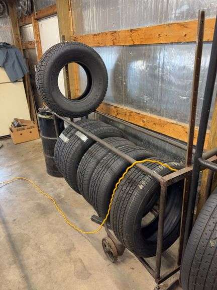 Metal tire rack on wheels - 74" long, 18" deep, 72" tall