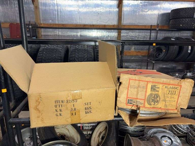(2) wheel rims in boxes - see photos