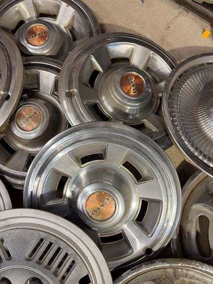 15+ hubcaps - see photos - PMD, Pontiac, and more