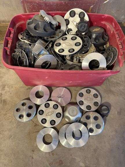 Large tote of hub caps and covers -Chevy, Ford and more