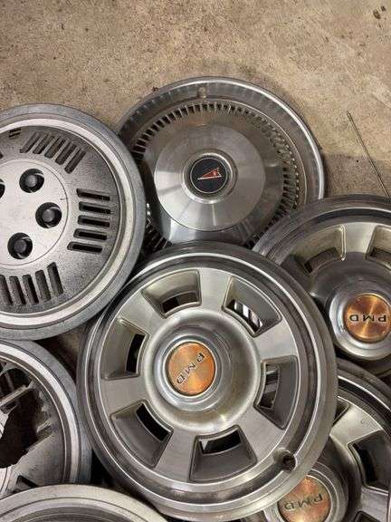15+ hubcaps - see photos - PMD, Pontiac, and more