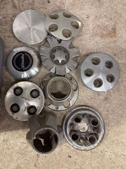 Tote of miscellaneous hub caps and parts -Limited, Chevy and more -see photos
