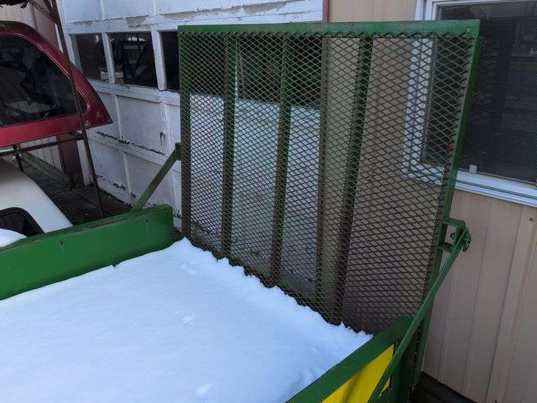 Open green and yellow trailer - 8' x 5' bed - 2" ball hitch - flat tire