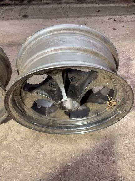 (3) wheel rims - (2) 15" and (1) 14"