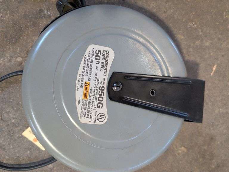 Work light on extension reel and suction gun