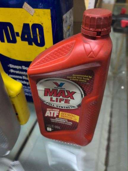 Flat of WD-40, oil, and other mechanic fluids