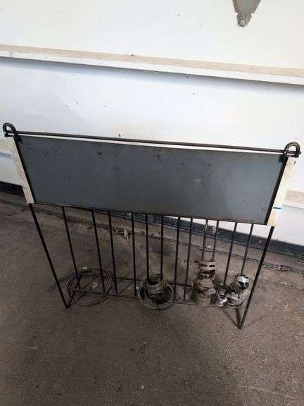 NAPA metal rack with hose clamps