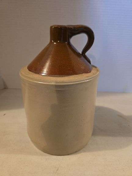 BROWN TOP 1 GALLON CROCK JUG HAS HAIRLINE ON BOTTOM