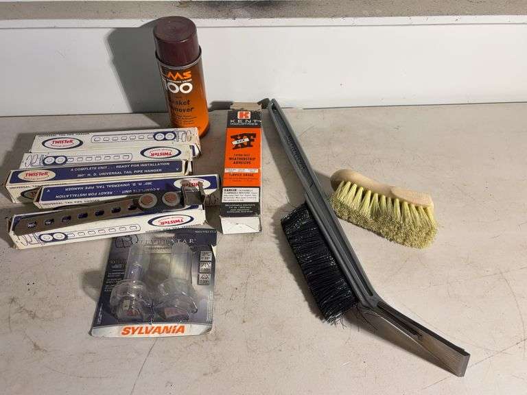 (5) Twister universal tail pipe hangers, lightbulbs, brushes and more